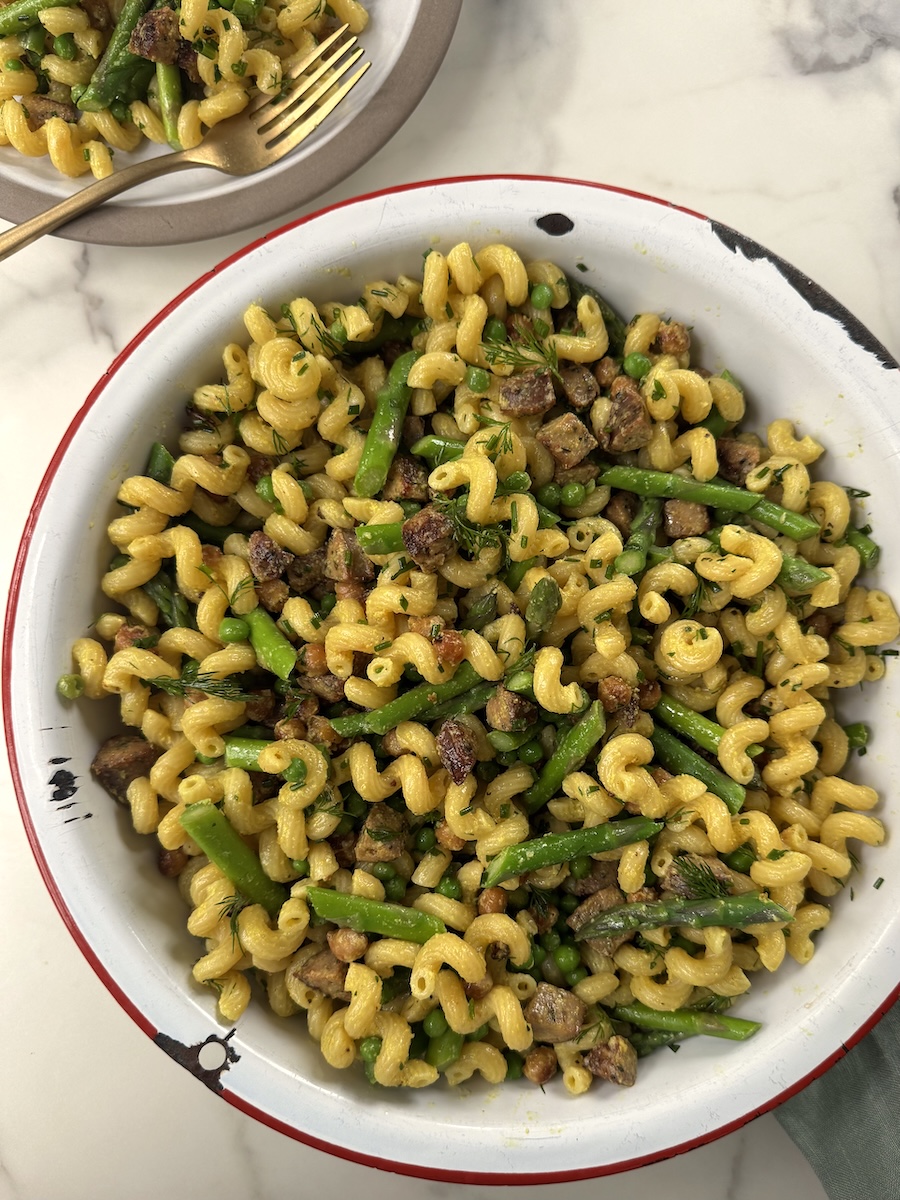 A vibrant pasta salad made with asparagus, peas, and Italian Herb Chicken Sausage.